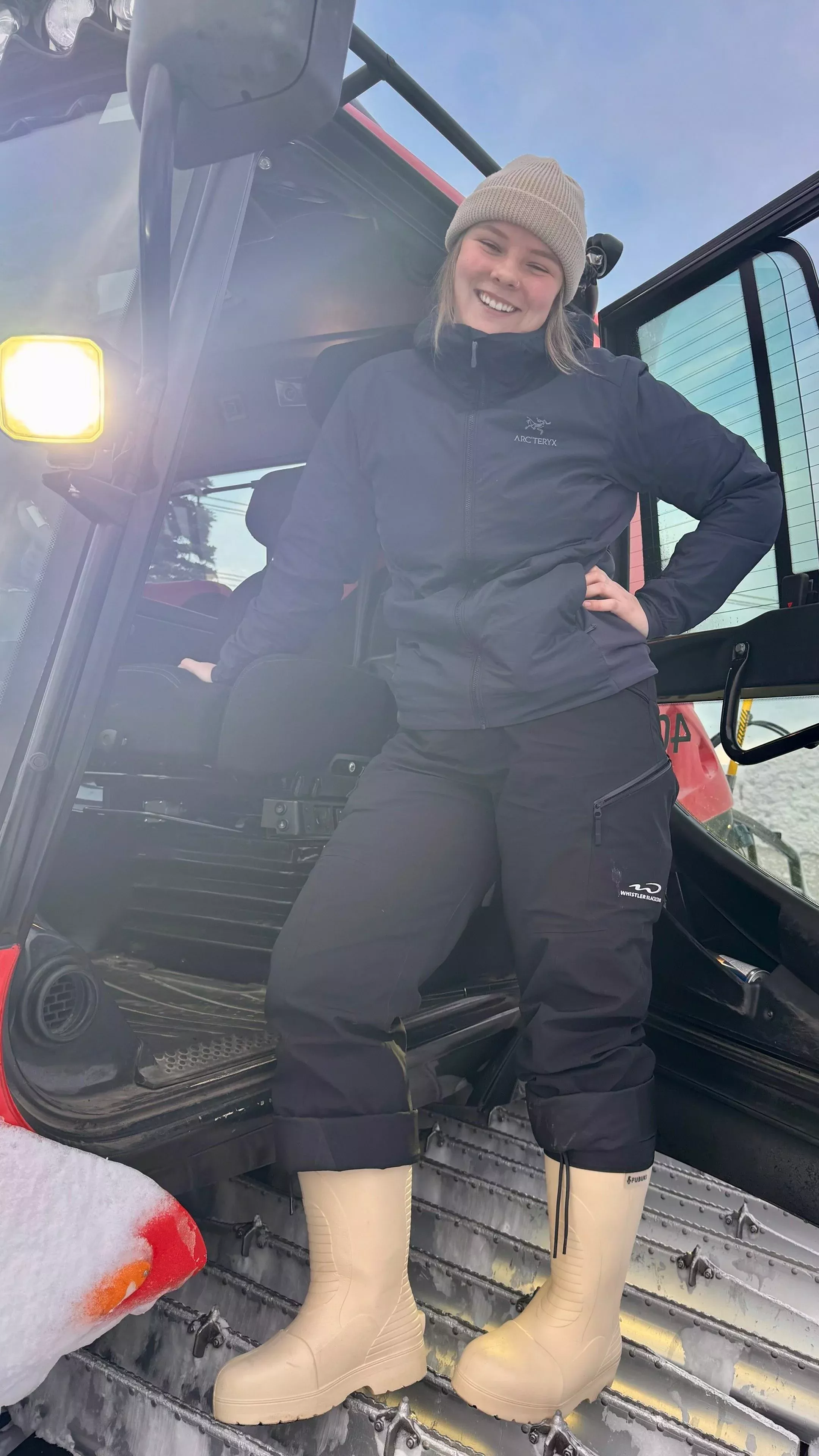 Lauren Basisty on the tracks of her snowcat at Whistler Blackcomb,